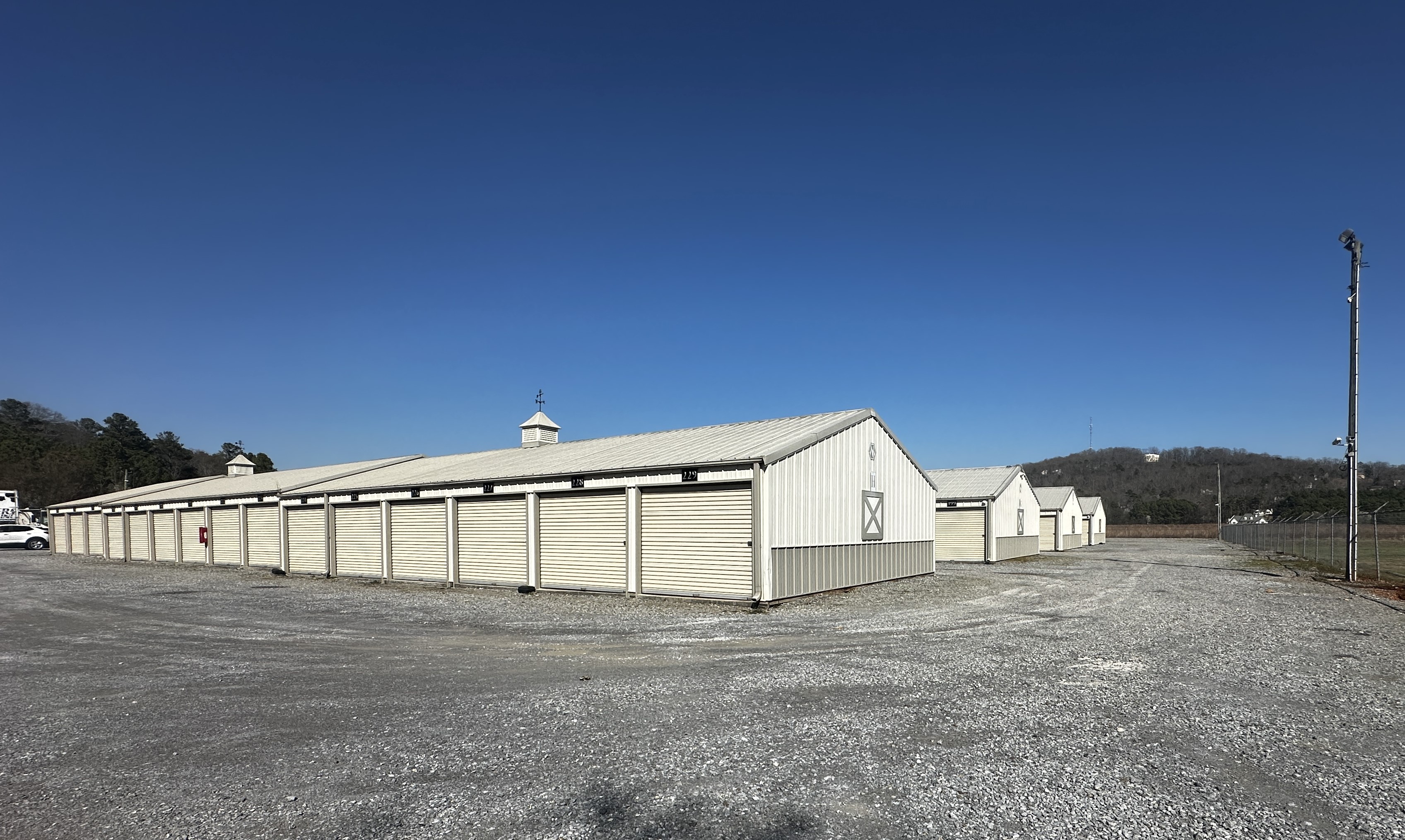 Drive-up storage unit at 255 McCormick Road, Cartersville, GA with security fence